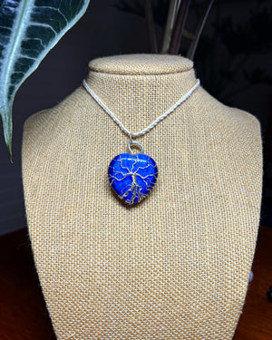 Sterling Silver Cat’s Eye Tree of Life Necklace: Strength and Stability